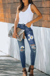 High Rise Distressed Skinny Jean